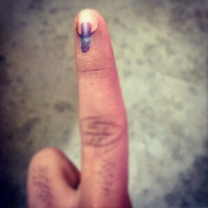 A_voter_finger_inked_in_Indian_elections_2013